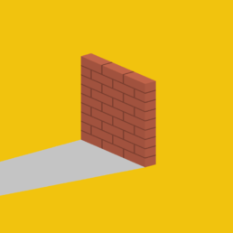 Uma parede de tijolos sobre fundo amarelo.