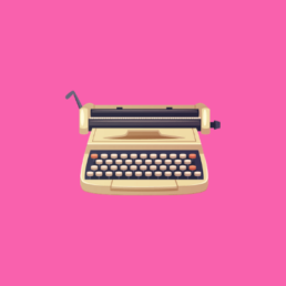 Máquina de escrever vintage sobre fundo rosa.